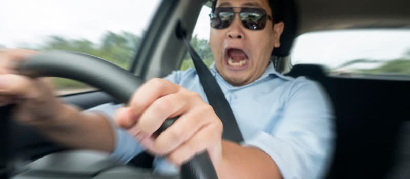 worried man driving