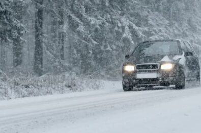 Car driving in snow