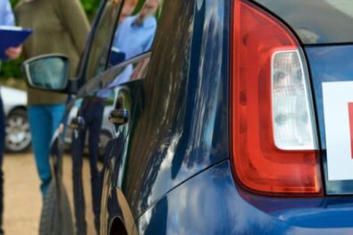 Learner talking to driving instructor